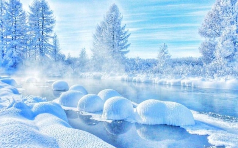 Never-freezing river in Mongolia in its winter splendor