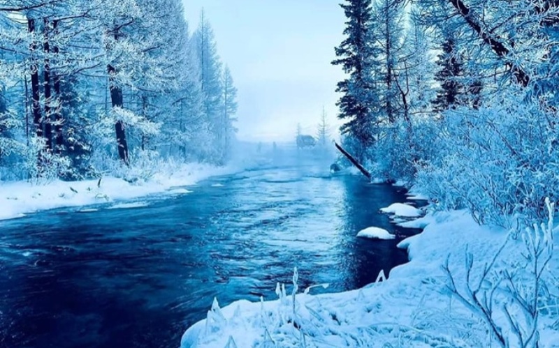 Never-freezing river in Mongolia in its winter splendor