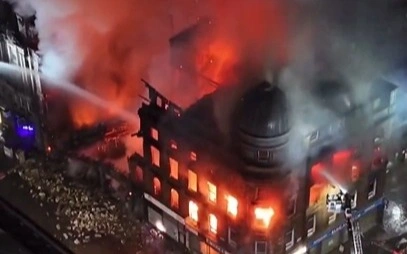 Building collapses after blaze in Glasgow, rail services disrupted