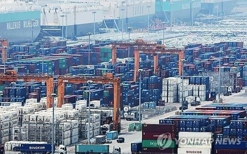 Containers are stacked at a port in Pyeongtaek, south of Seoul