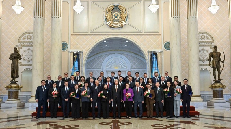 Head of State awards scientists, hands over keys to apartments 