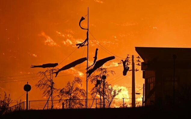 Over 1,000 people urged to evacuate as wildfires rage in northeastern Japan