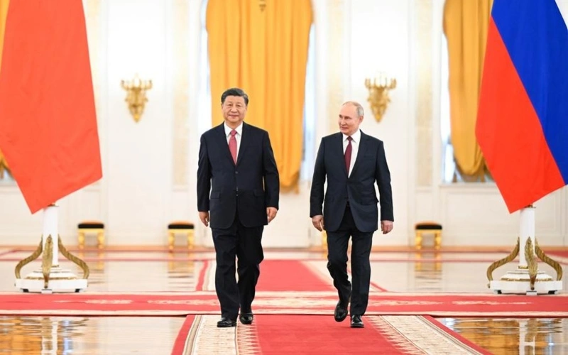 Путин совершит визит в Китай