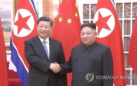 Xi Jinping and Kim Jong-un