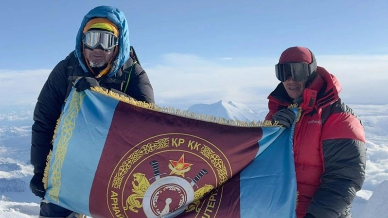 Kazakh armed forces servicemen raise National Flag on Denali