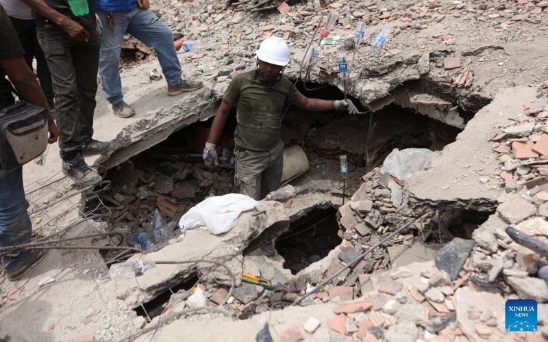 Venezuela quake death toll rises to 1,719
