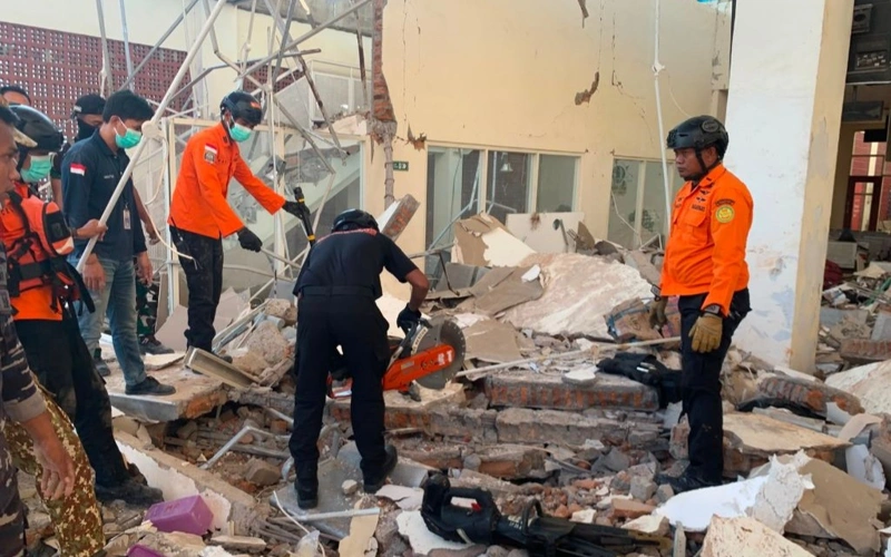 Rescuers conducting search and rescue operations after an earthquake, on Flores Island, Indonesia, on Aug. 15, 2026.