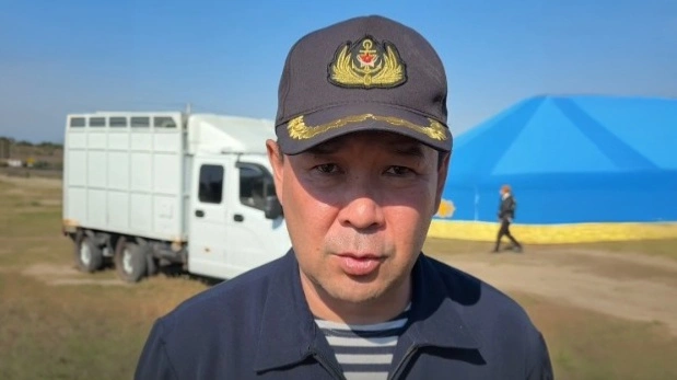 Арман Сатканов