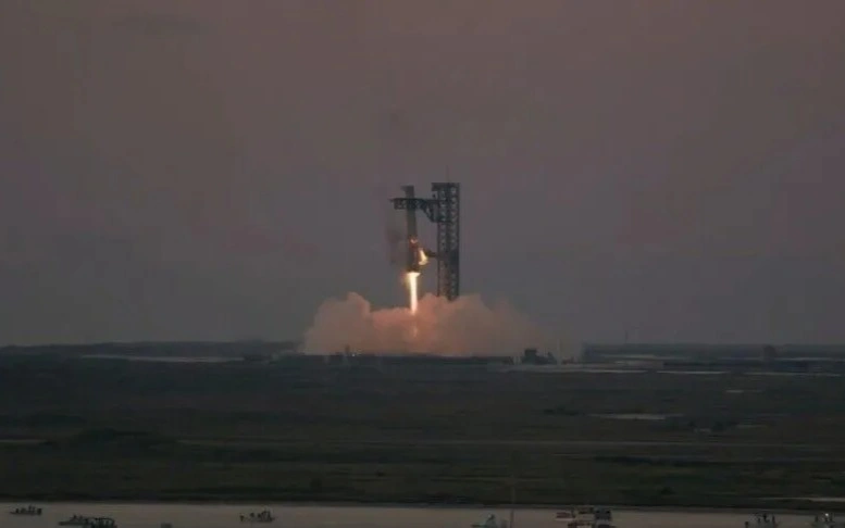 SpaceX launches giant Starship rocket on first orbital mission 