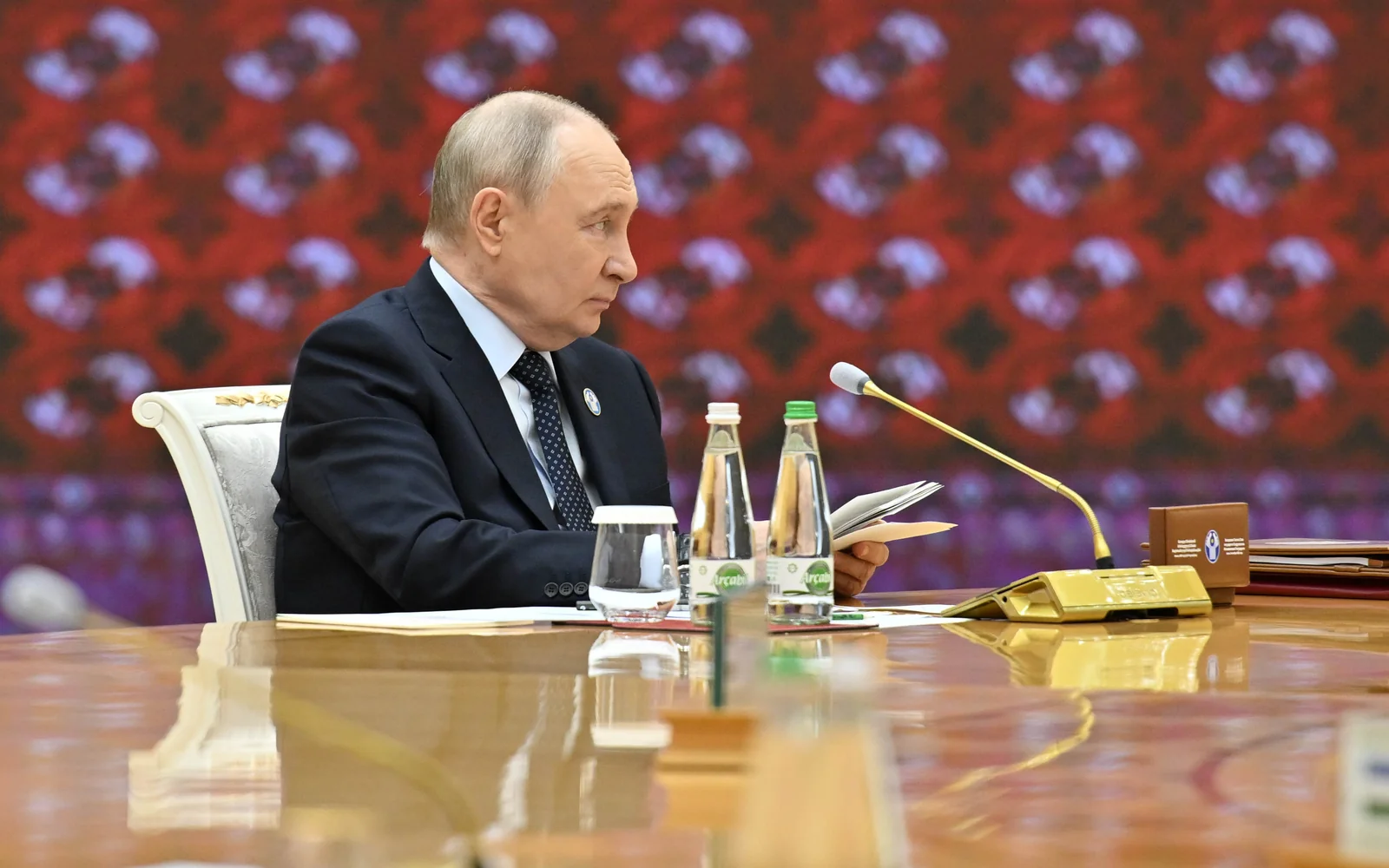 Путин