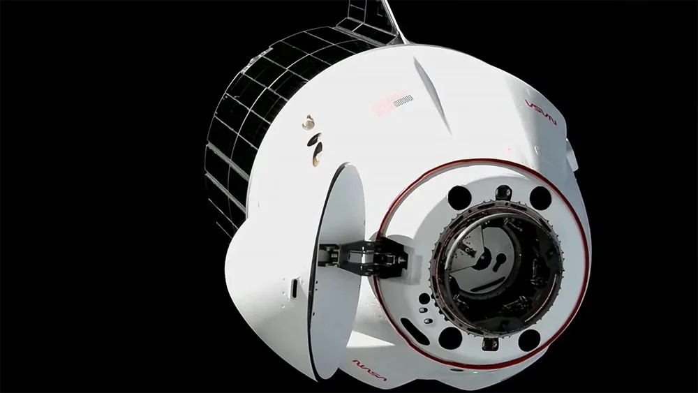 SpaceX Dragon docks with ISS, delivering new cargo