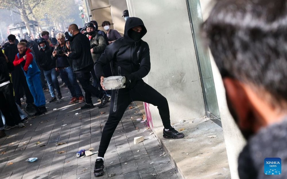 Around 550,000 join protests across France, nearly 400 arrested