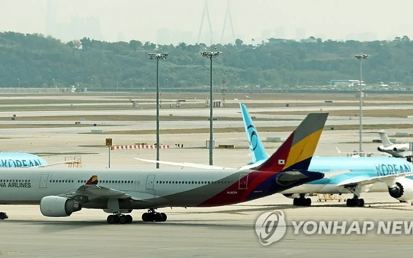 Airplanes are parked at a terminal at Incheon International Airport, west of Seoul, on Oct. 23, 2026. 
